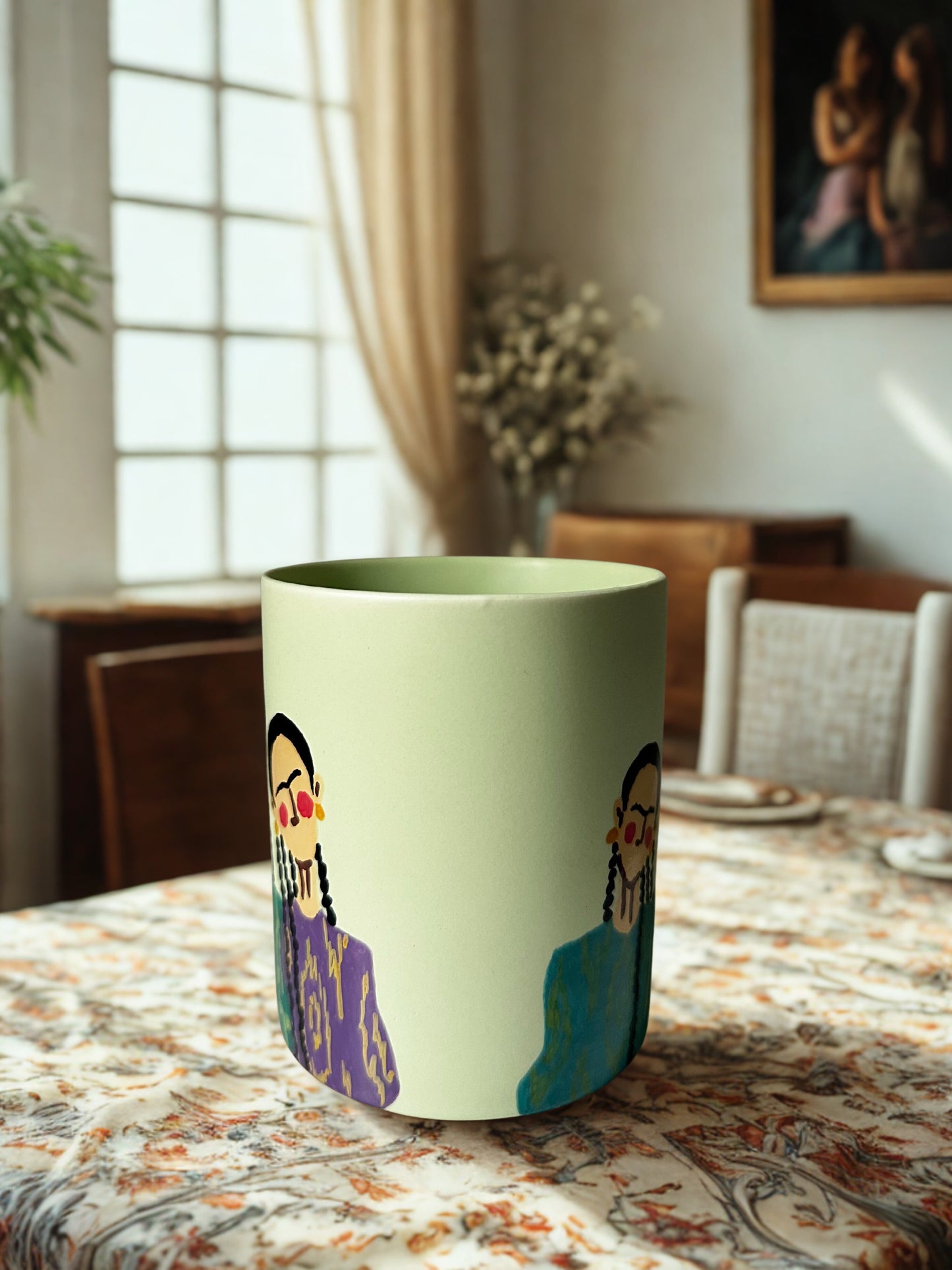 3 Uyghur girls on pastel green mug