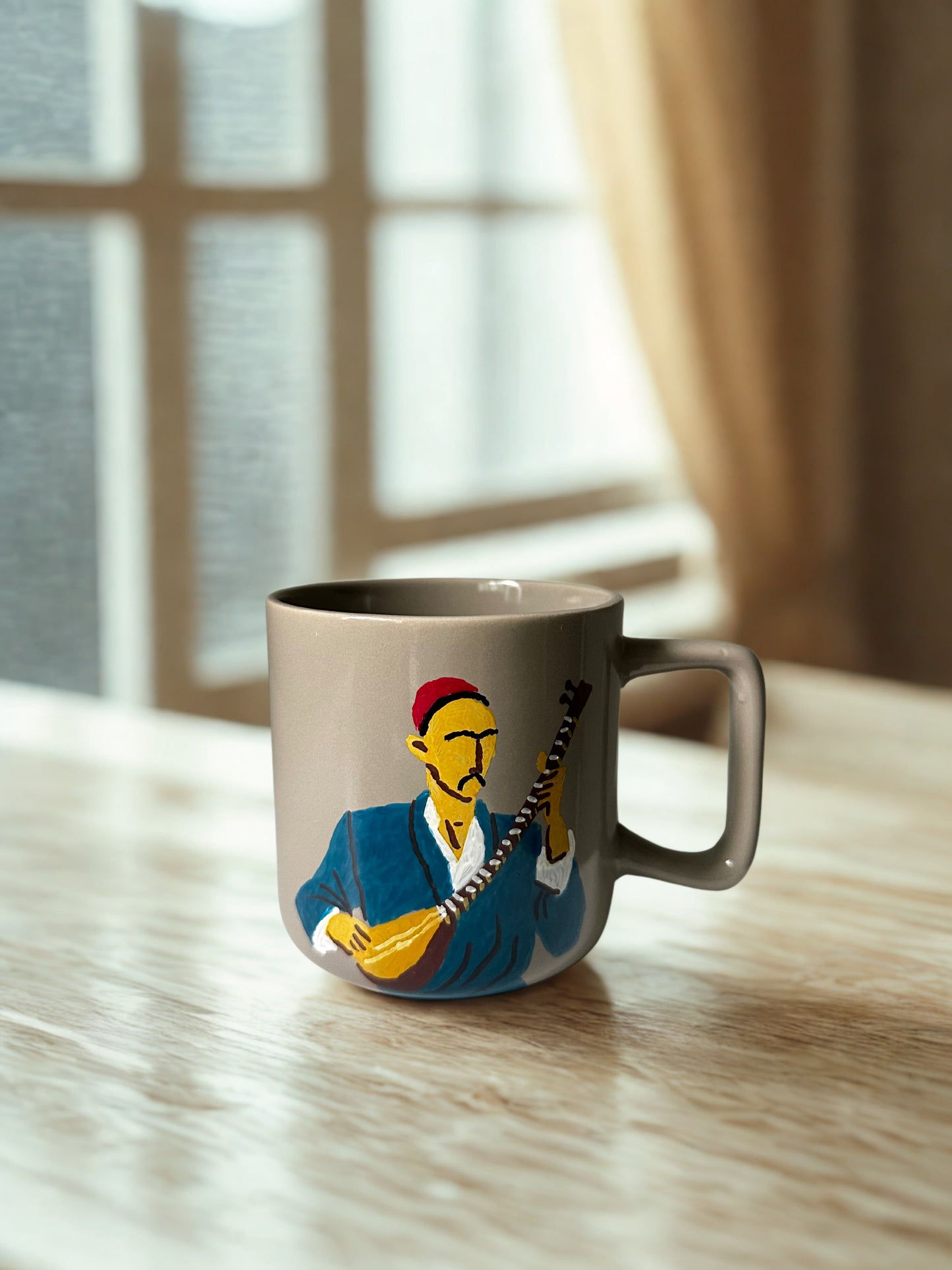 Duttar man on sand mug