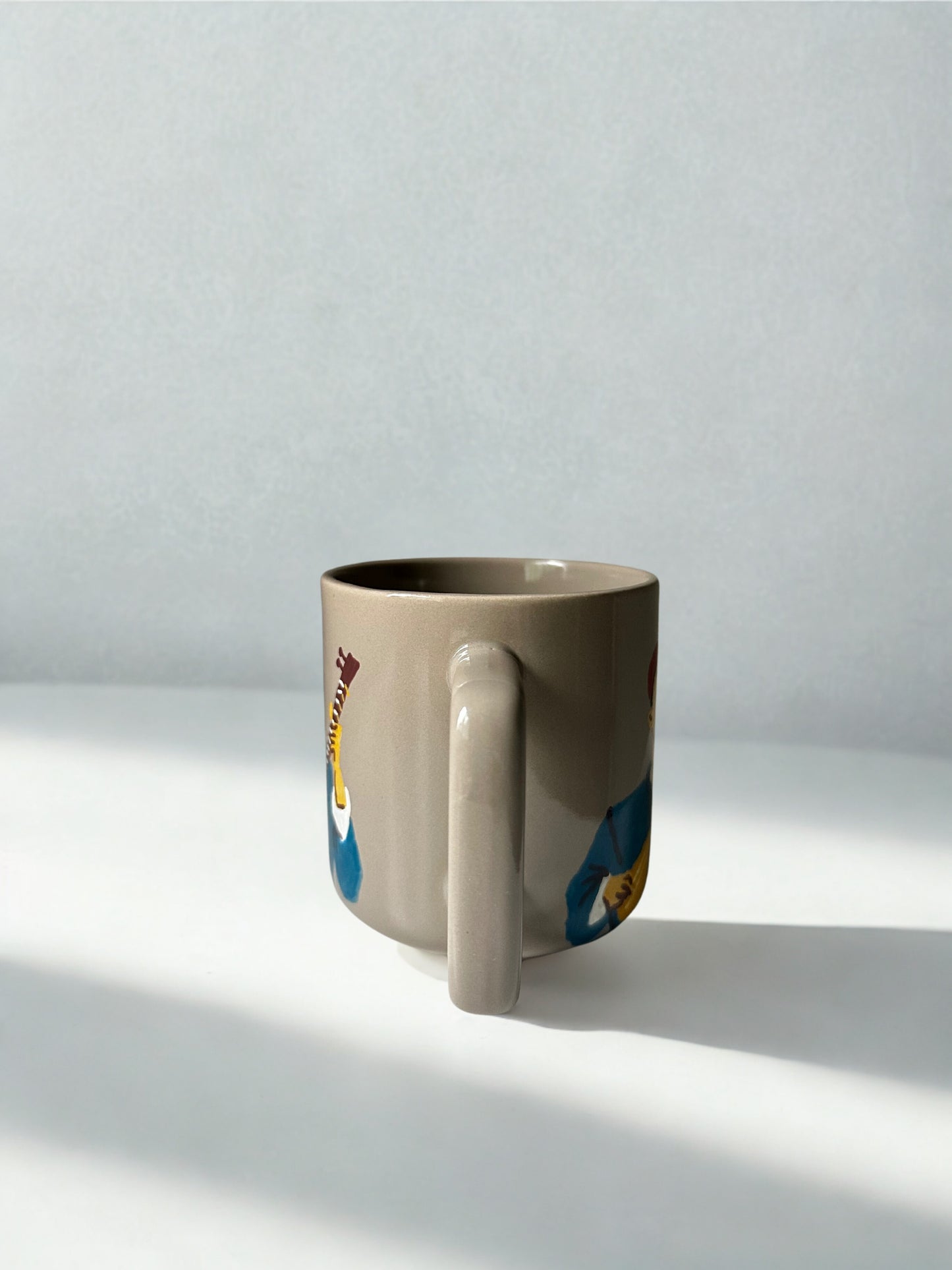 Duttar man on sand mug