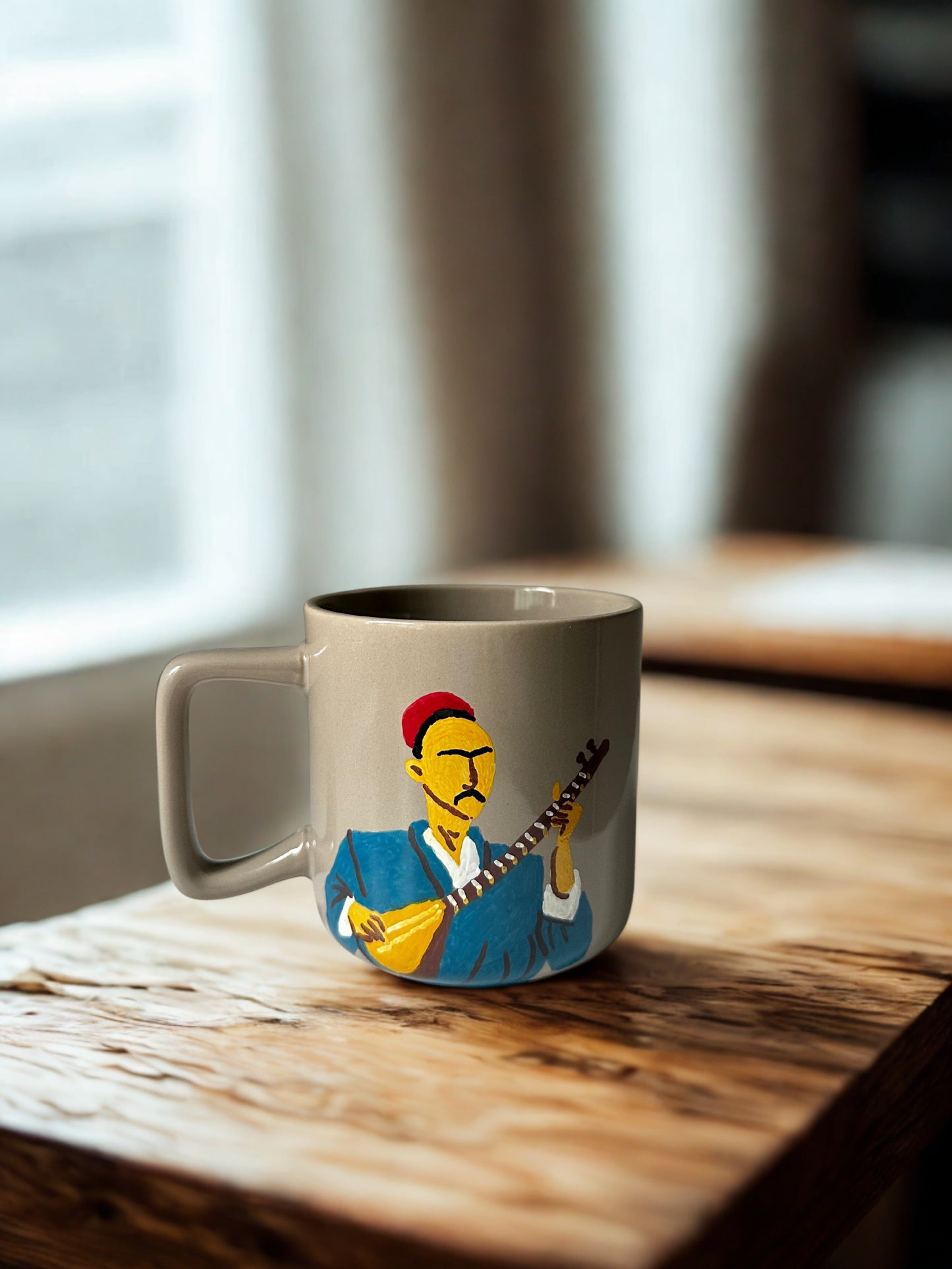 Duttar man on sand mug
